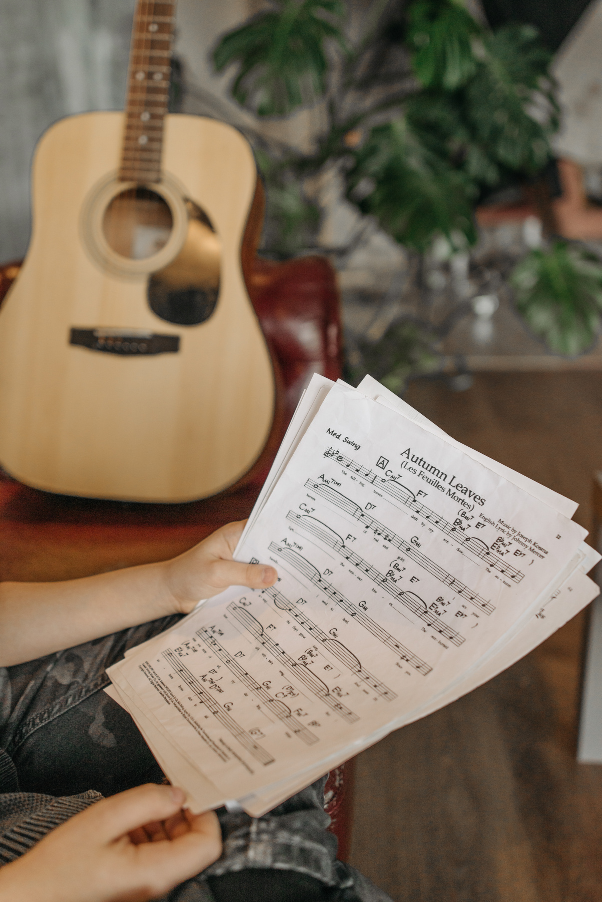 Person Holding Music Sheets